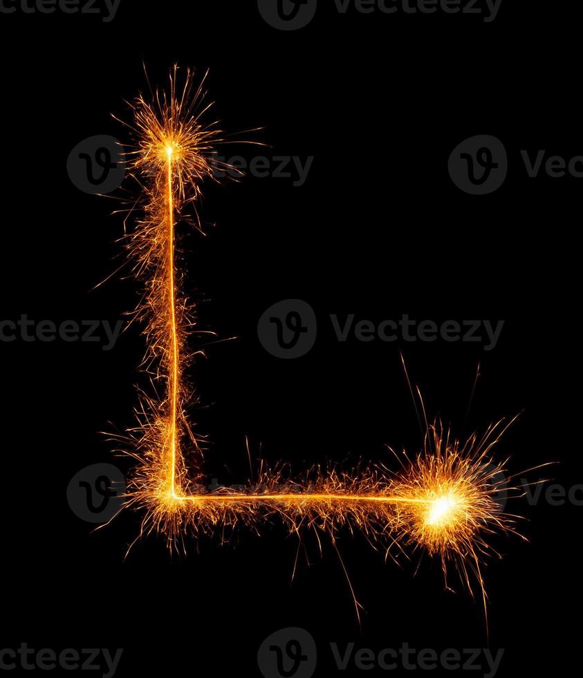made with sAlphabet element made with sparklers ready for your inscriptions on black background photo
