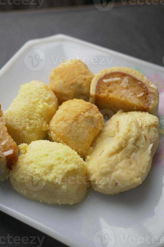 close up of indian sweet in a bowl on table. photo