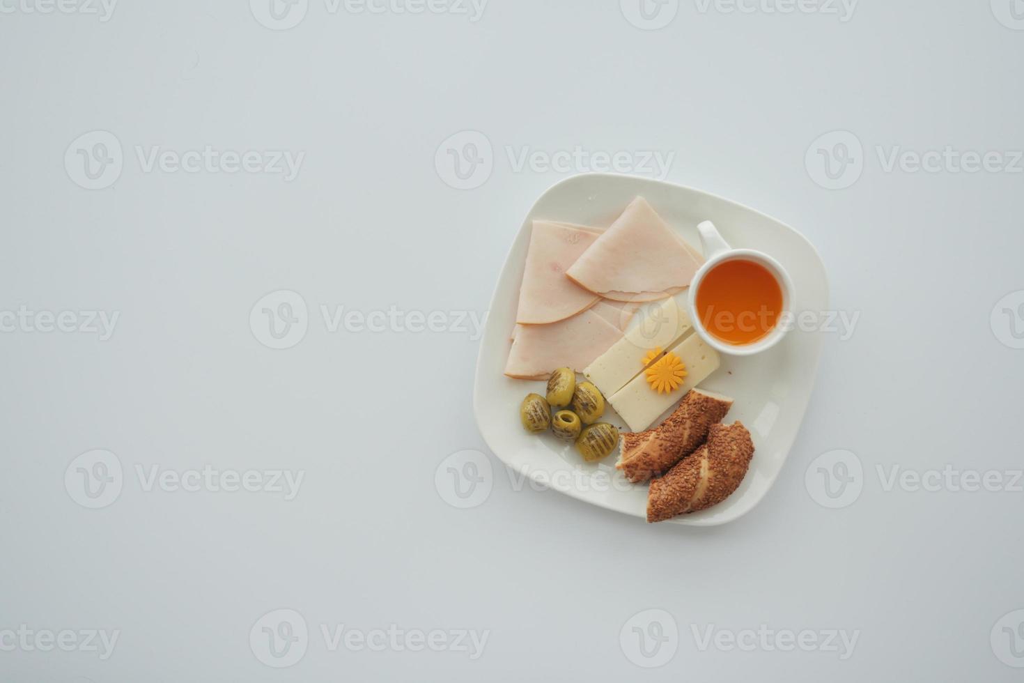 cheese , olive and bread on table photo