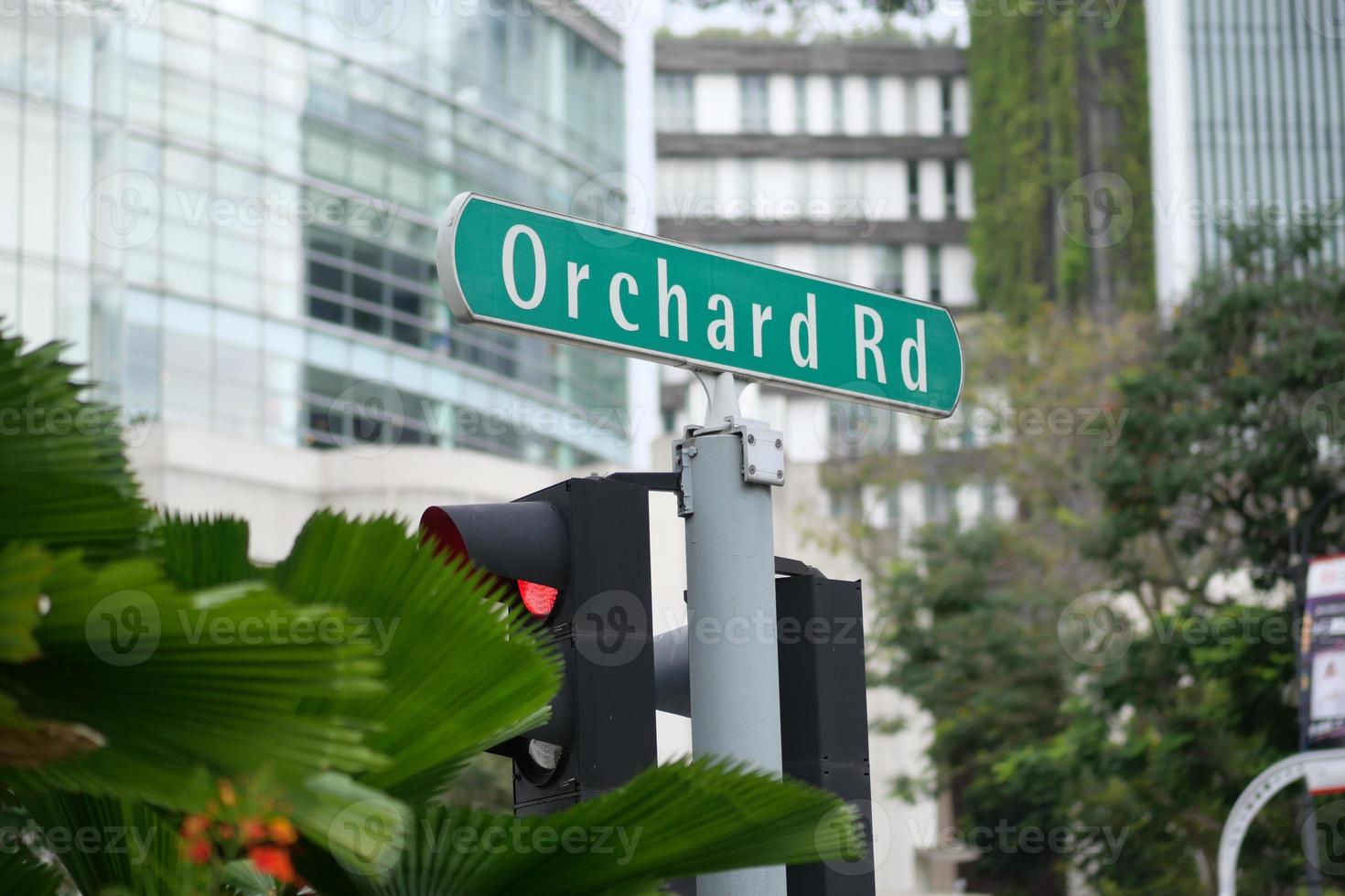 orchard road signn and buildings photo