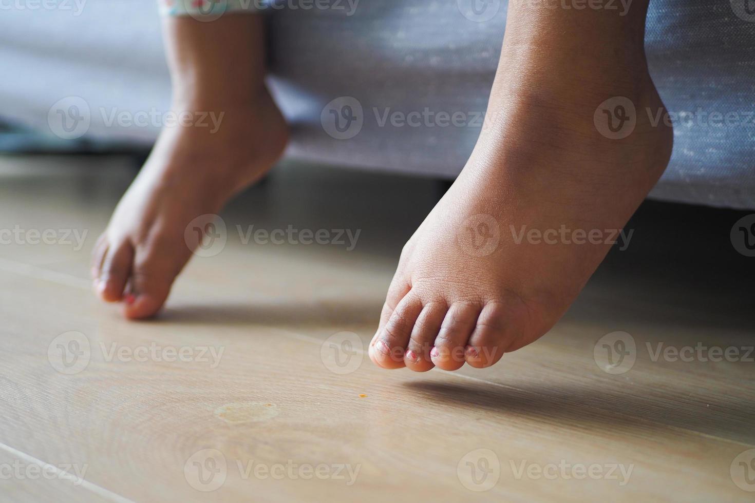 5 year old child girl feet close up photo