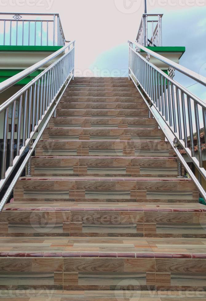 Photo of a staircase building object that looks directly into the sky, in the afternoon at the pandeglang area mosque