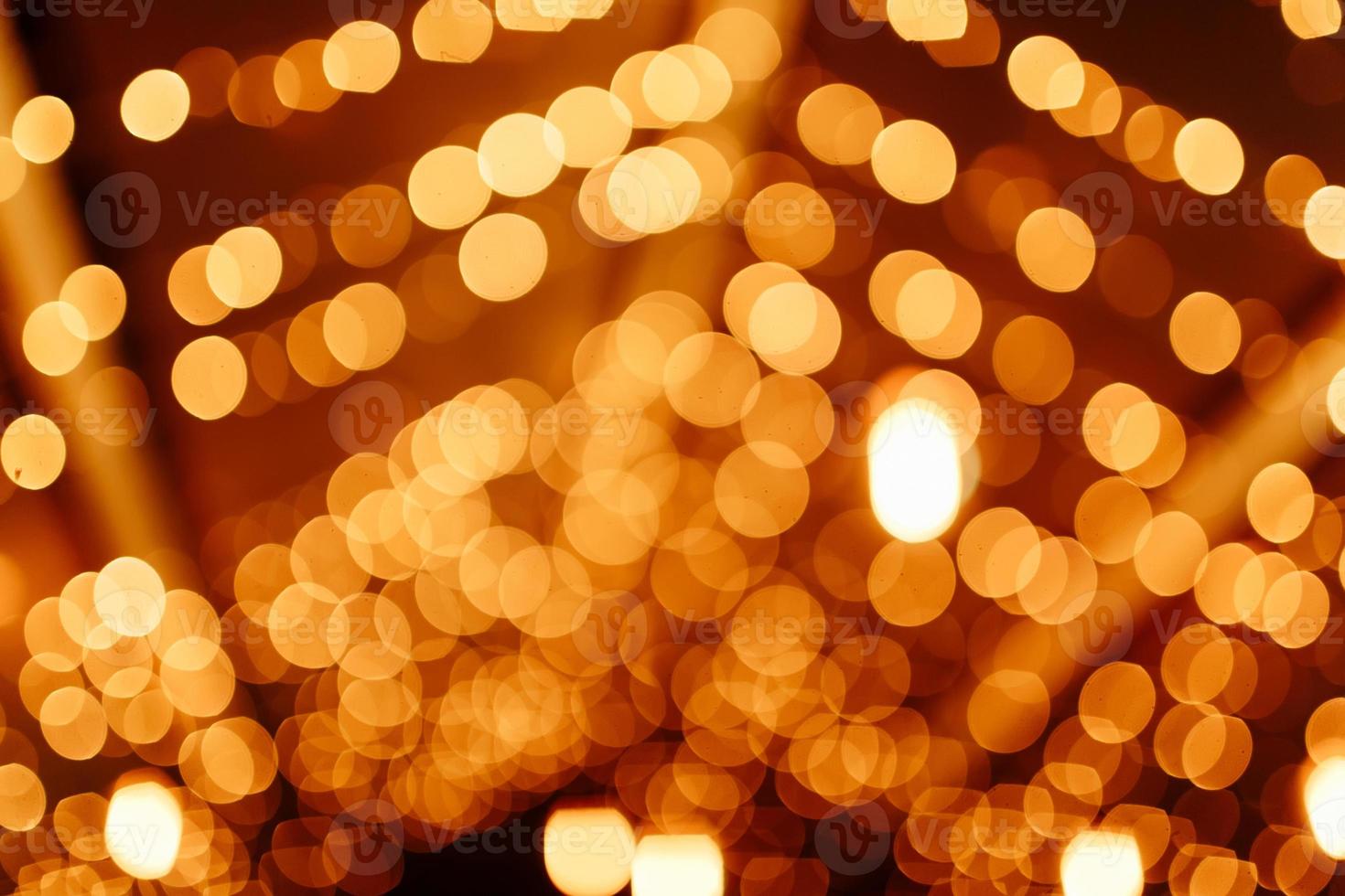 Abstract golden blurred christmas lights bokeh background. Beautiful