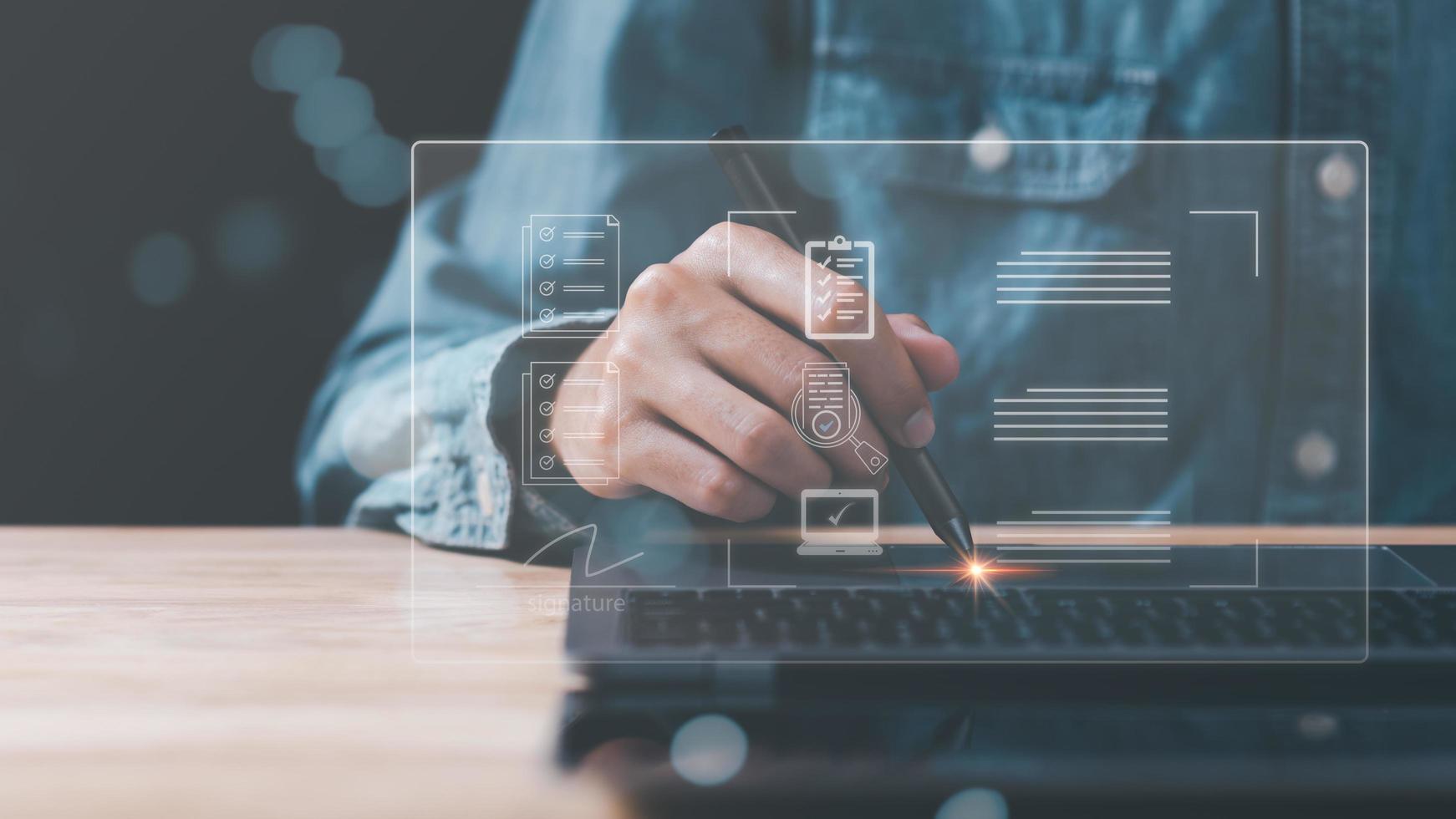 Businessman signing documents online ,Signing a form ,validates and manages business documents and agreements ,contract documents confirmation or warranty certificate ,electronic signature concept photo