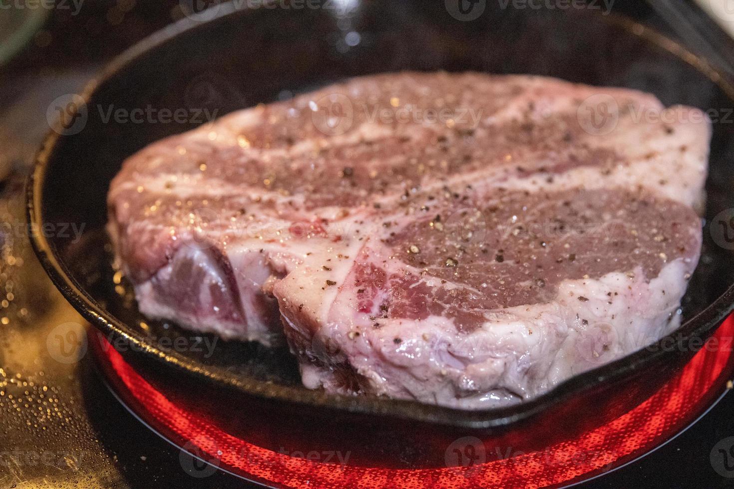 Porterhouse Steak searing photo