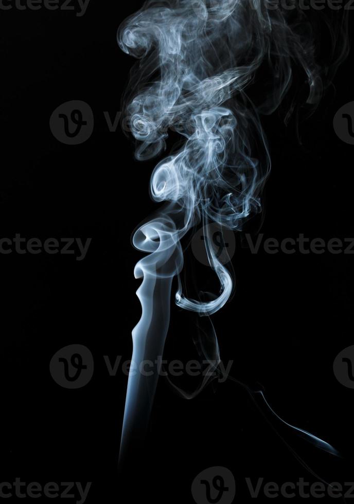 Abstract light smoke on dark background photo