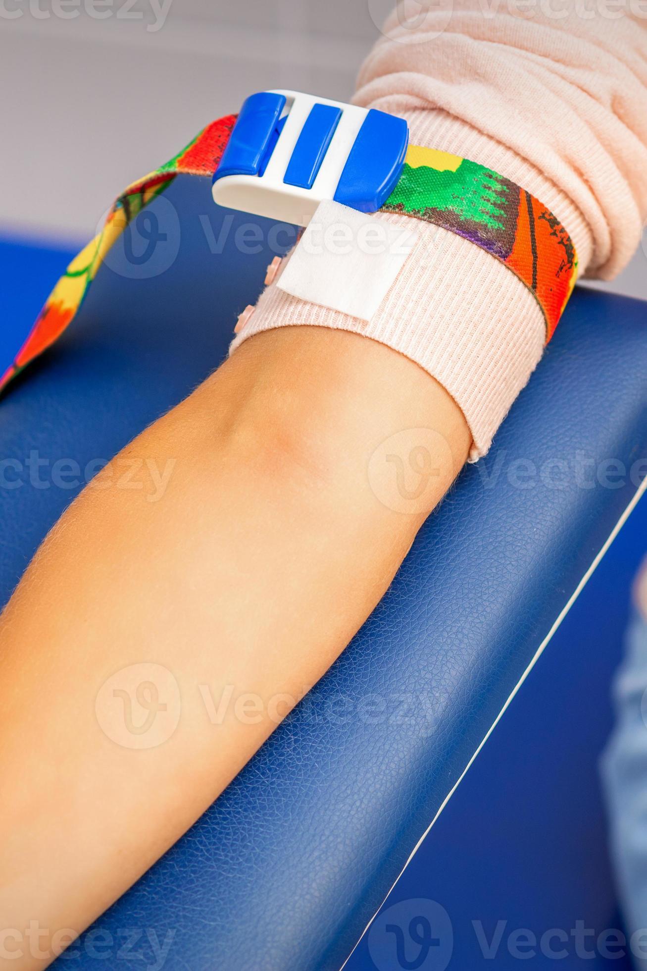 Medical tourniquet on the hand 21135905 Stock Photo at Vecteezy