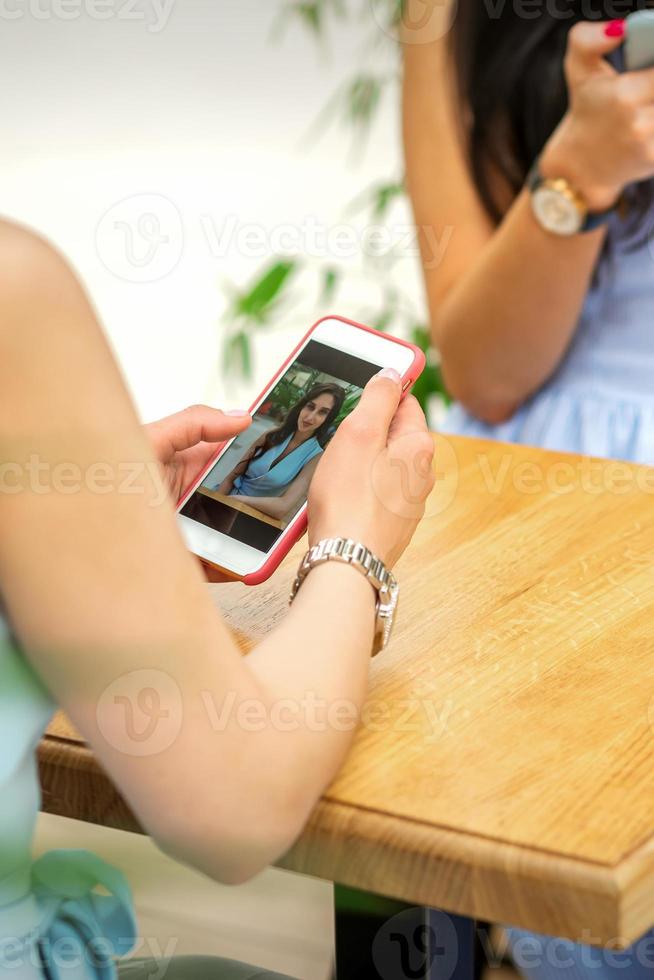 Woman looking at photos on phone