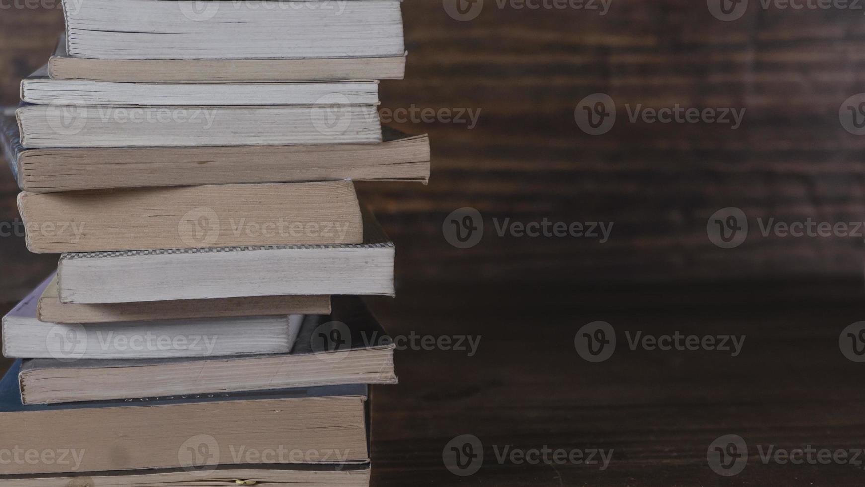 Stack of books over wooden table. Library, Read. Edication. Literature photo