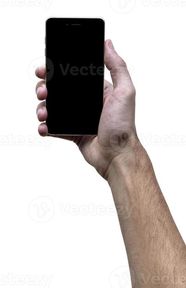 Male hand holding black cellphone with black screen at isolated white background. photo