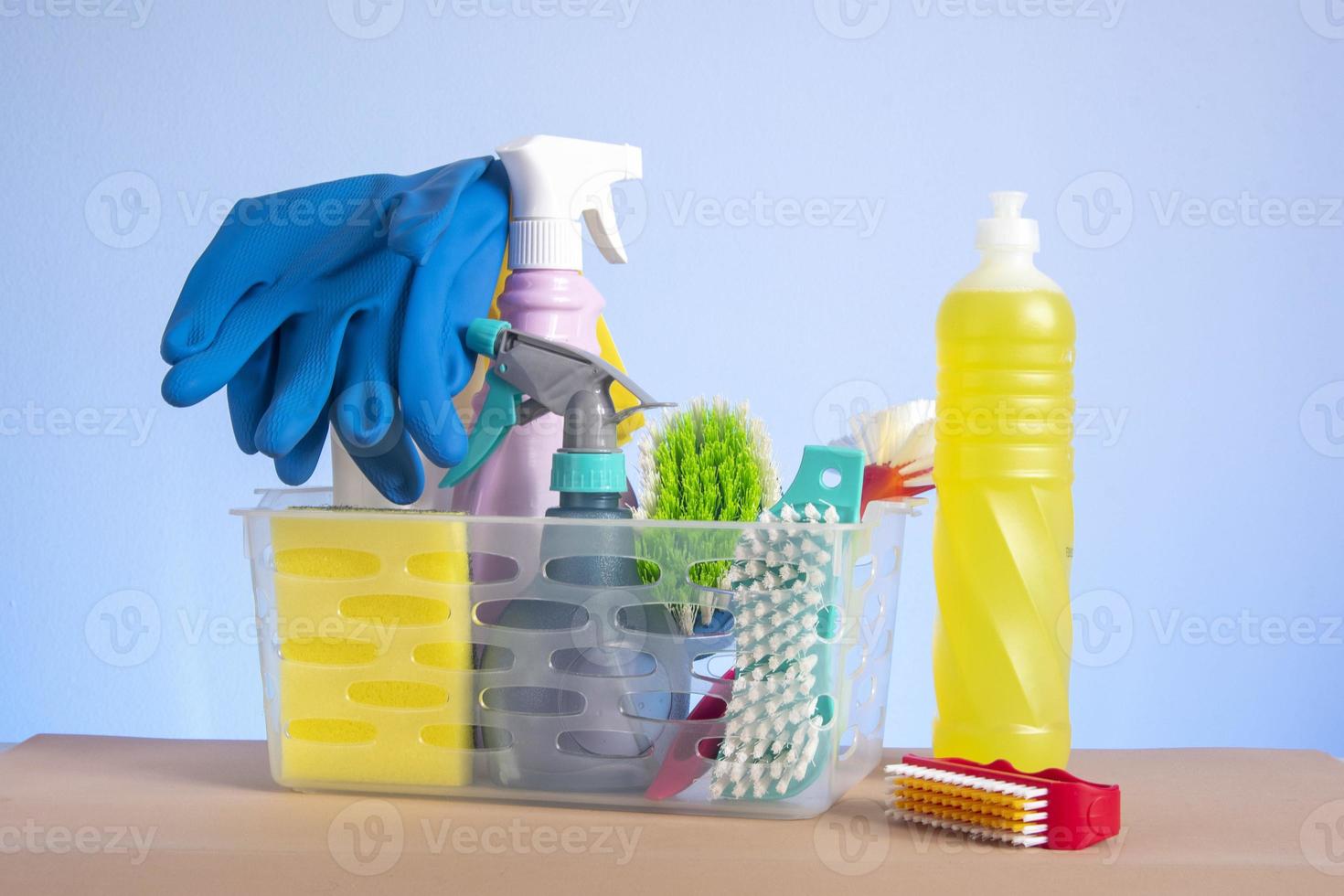 basket with cleaning products for home hygiene use photo