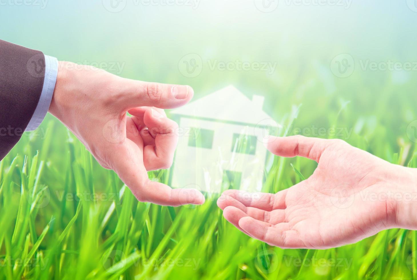 From hand to hand  the house. photo