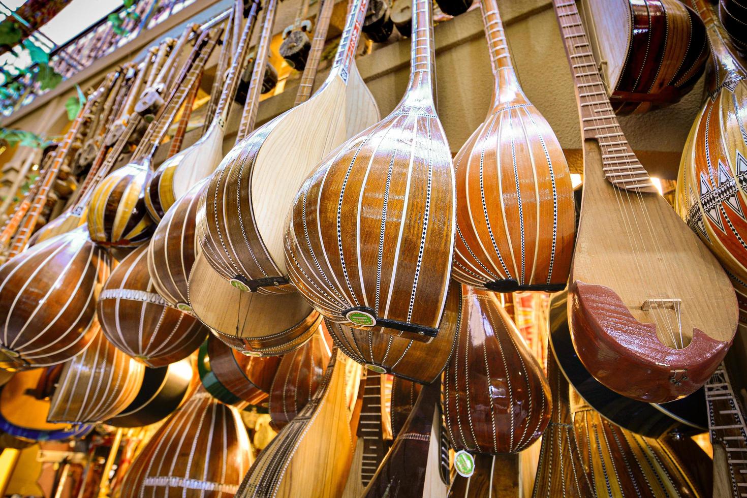 Vendors selling dutar in Grand Bazaar, Xinjiang, China photo