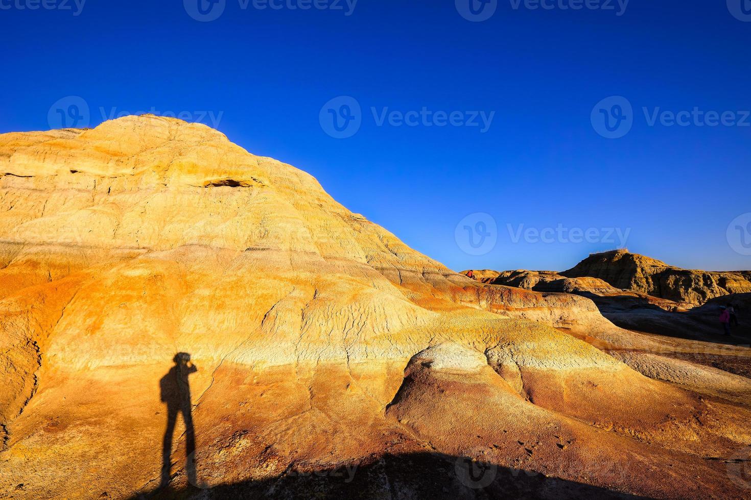 Trekking in The Wucai City Scenic Area near Urumqi, Xinjiang, has a magnificent and dazzling view of the Danxia landform. photo