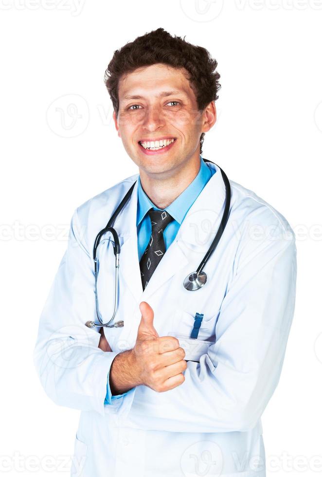 Portrait of a smiling male doctor with finger up on white photo