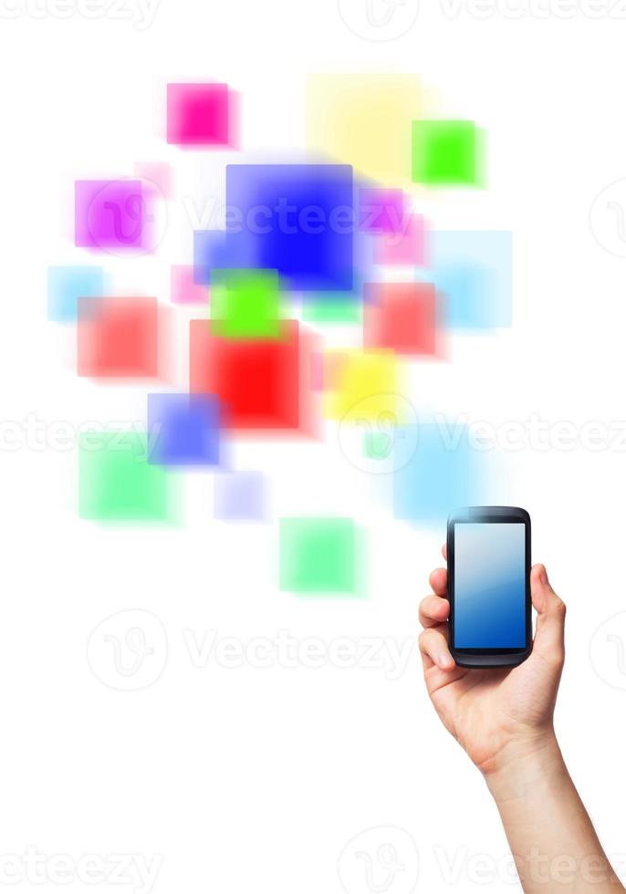 Cell phone and a futuristic digital depiction of social media over white background photo