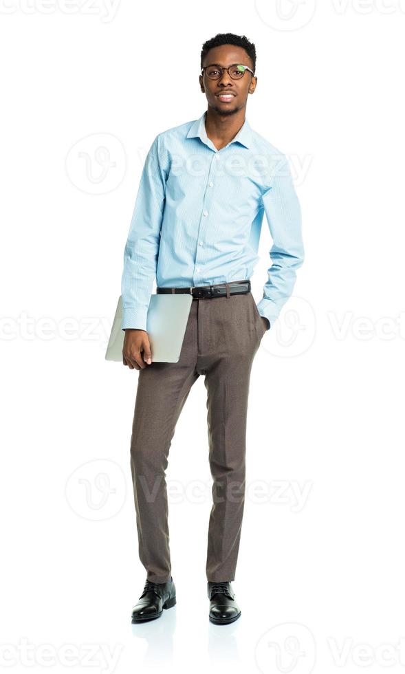 Happy african american college student with laptop photo