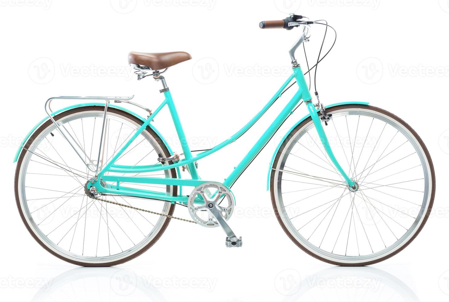 Stylish womens blue bicycle isolated on white photo