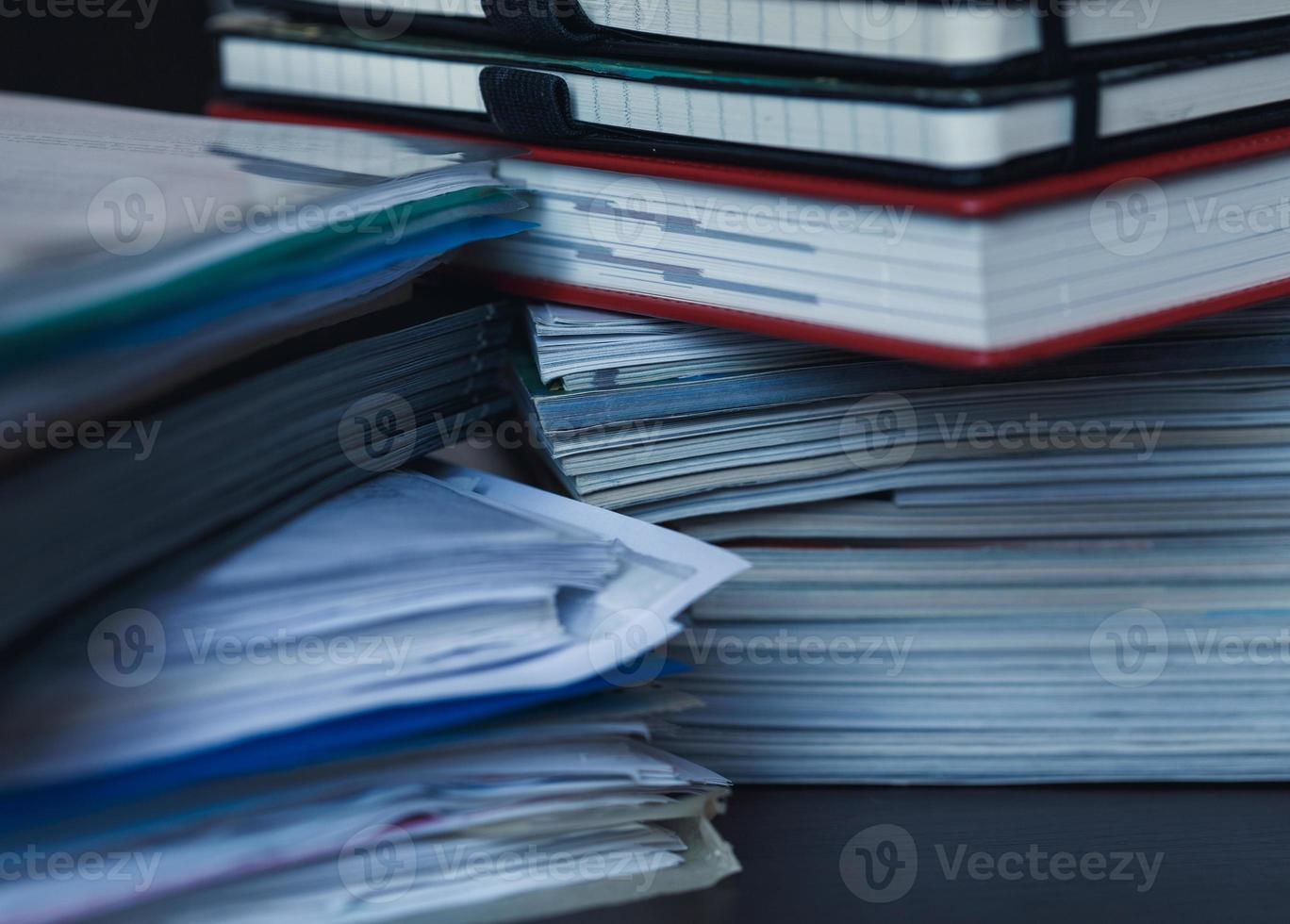 Large pile of magazine, notebook and books closeup photo