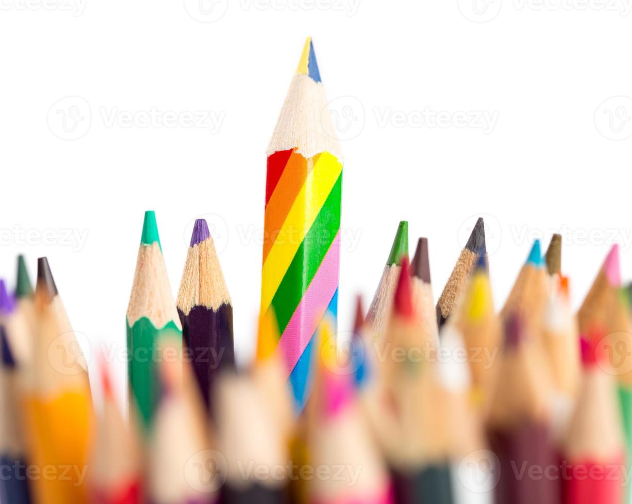 Colour pencils isolated on white background close up photo