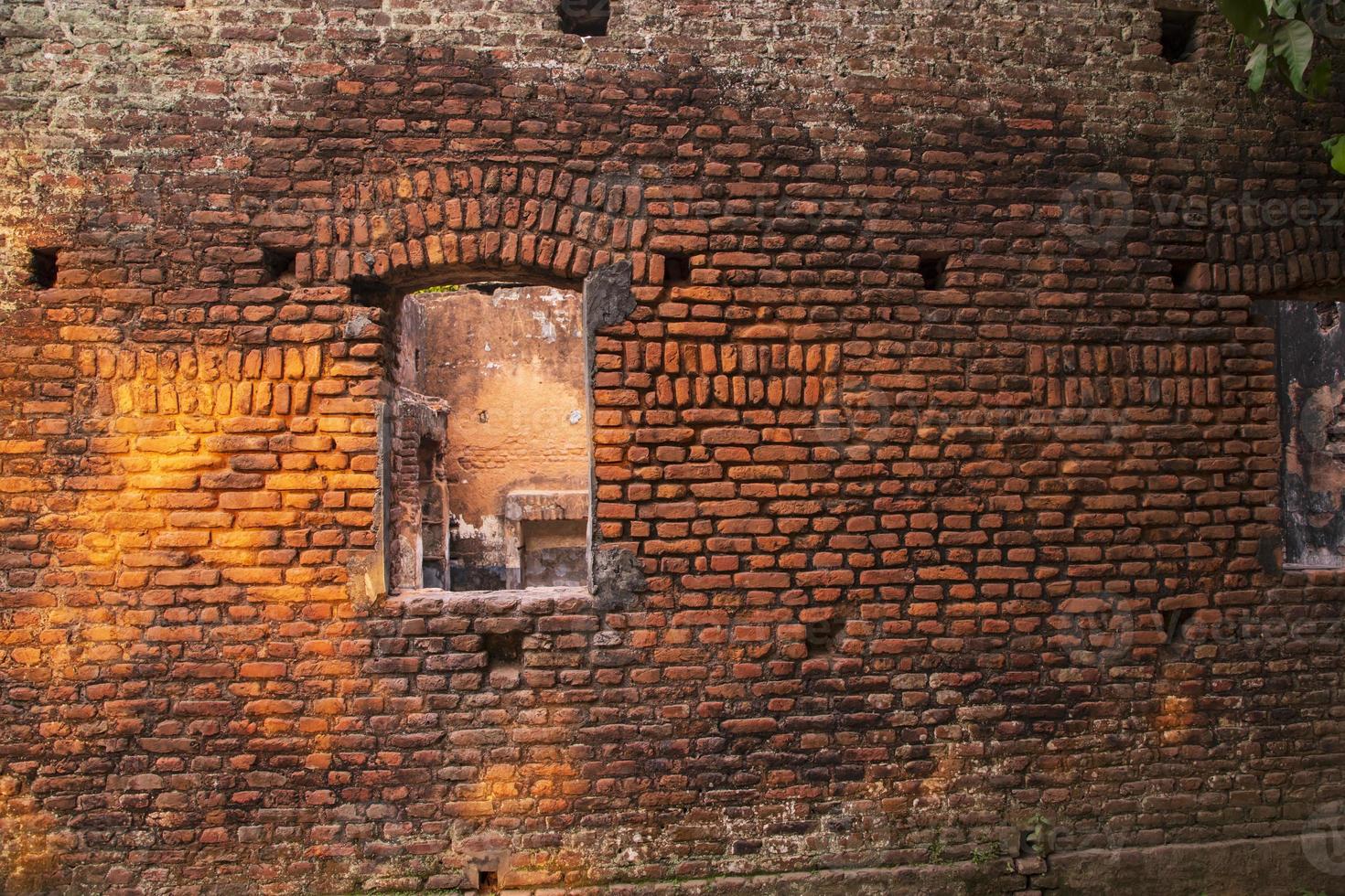 Old historical building brick wall grunge pattern texture can be used as a background wallpaper photo