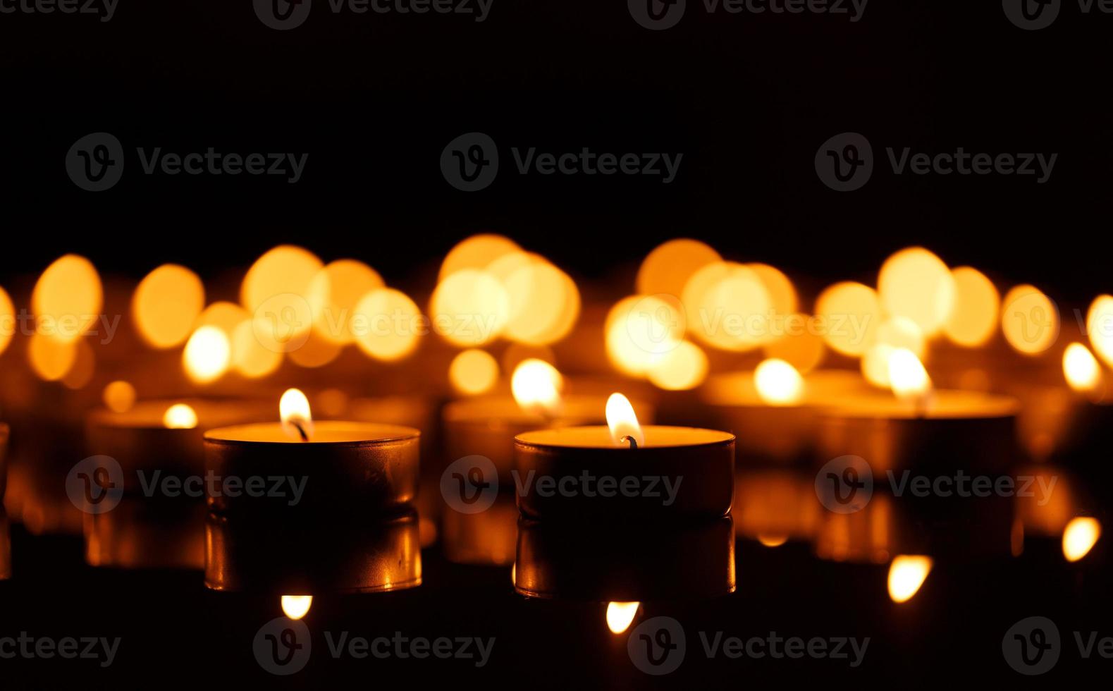 Burning candles with shallow depth of field photo