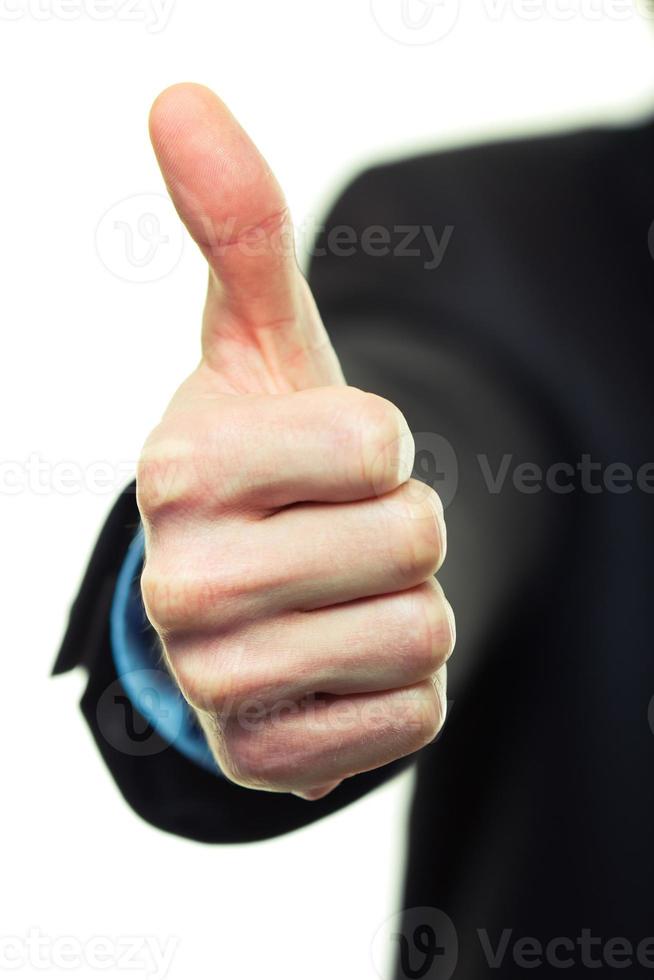 Business man hand with thumb up photo