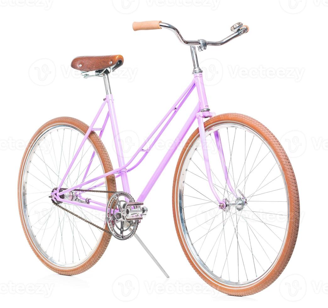 elegante De las mujeres rosado bicicleta aislado en blanco foto