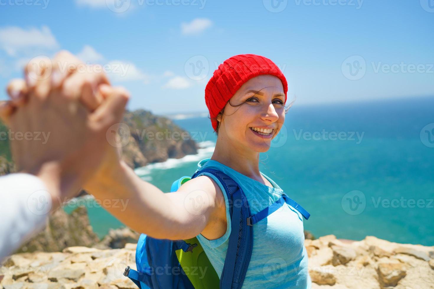 Woman by a beautiful coast photo