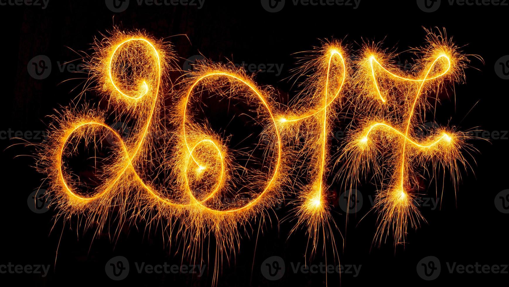 Happy New Year - 2017 with sparklers on black photo