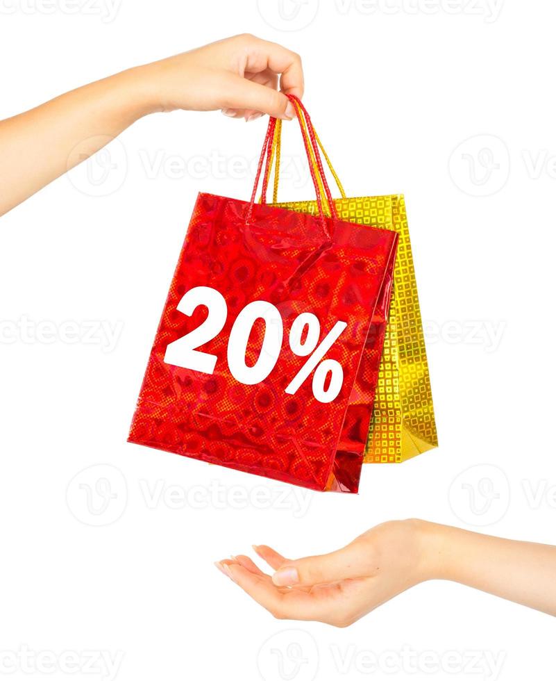 Woman's hands with shopping bags photo