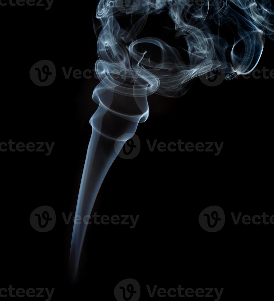 Abstract light smoke on dark background photo