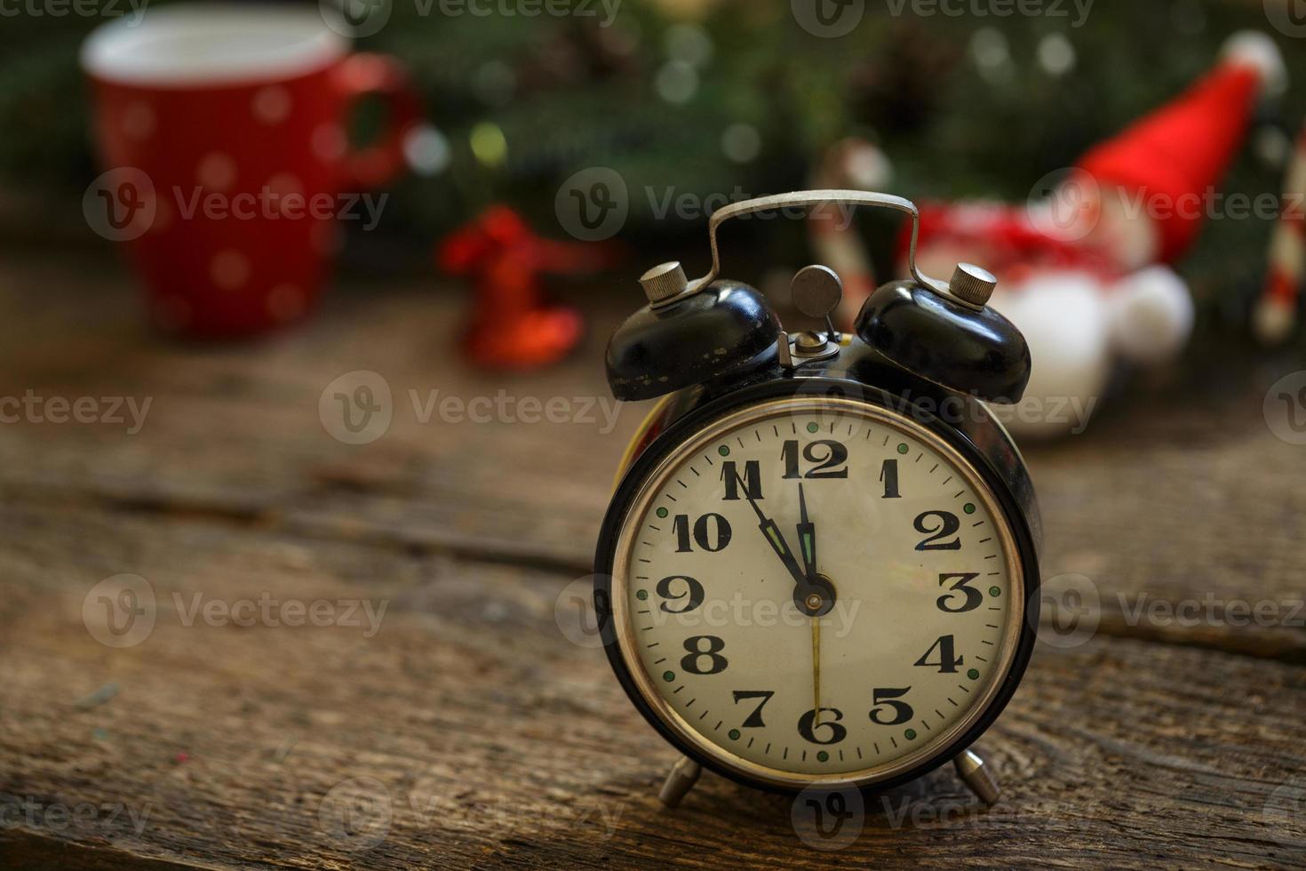 Vintage clock on christmas background photo