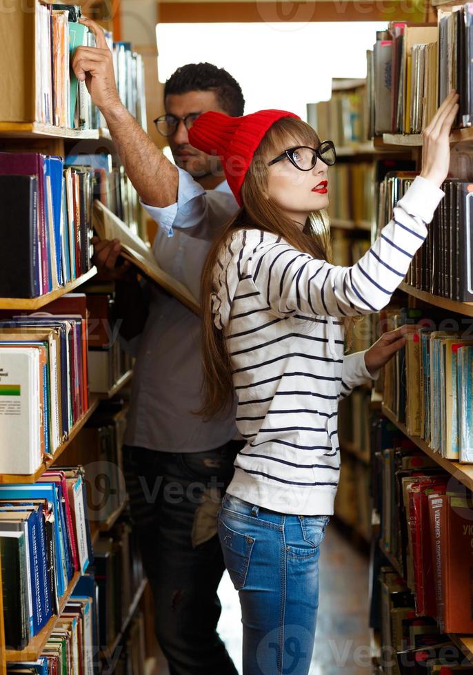 Young couple at the library photo
