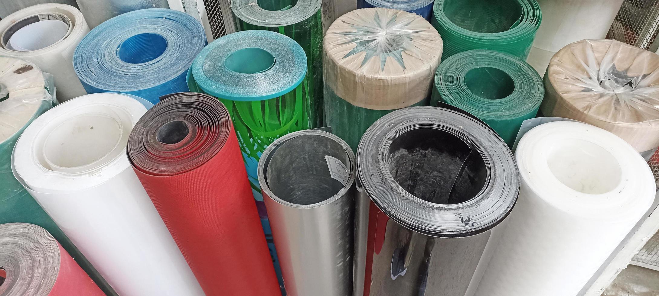 Photo of carpet rolls with various colored seju