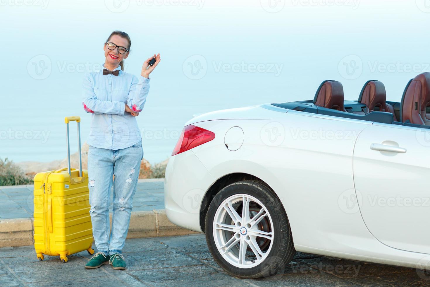 Young woman with new car photo