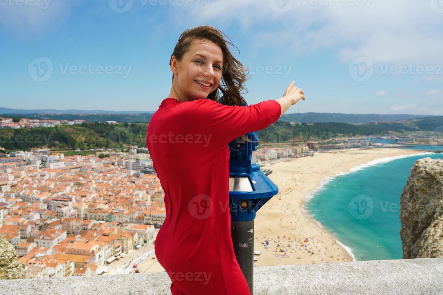 Woman by a beautiful coast photo