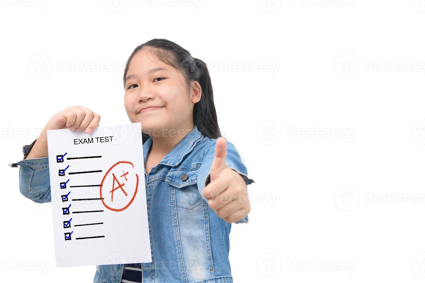 cute smart girl student showing  perfect grade test ressults, photo