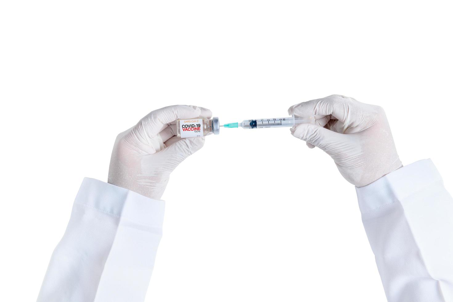 Doctor or scientist hand in white gloves holding flu, measles, coronavirus vaccine shot for diseases outbreak vaccination isolated photo