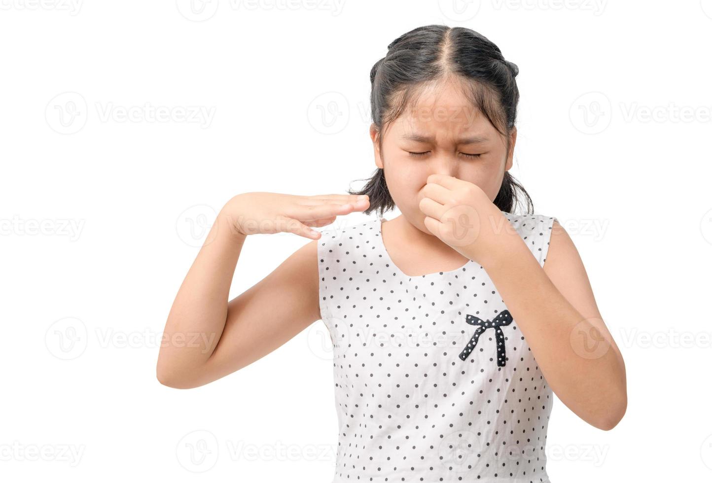 unhappy kid feeling bad and dislike smell and hold nose from funny odor, photo