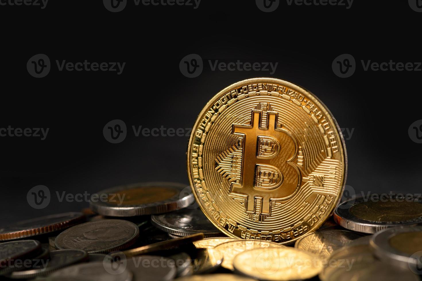 Cryptocurrency golden bitcoin coin on Thai Bath coin, electronic virtual money photo