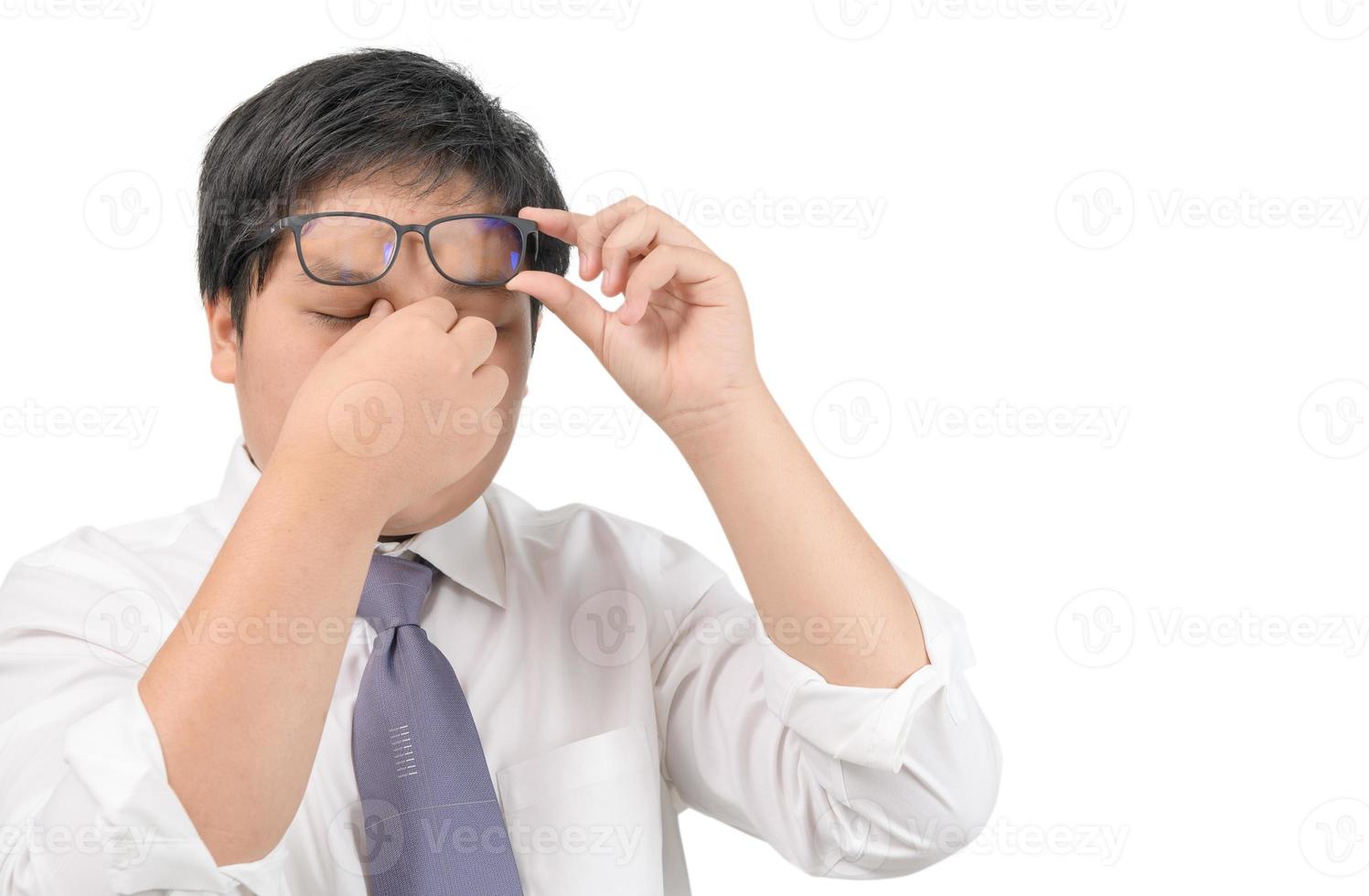 young boy feel pain in their eyes after studying online from computers