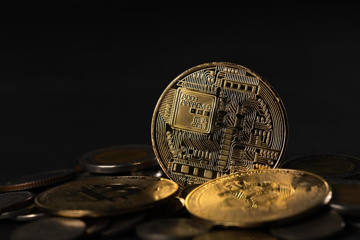 Cryptocurrency golden bitcoin coin on Thai Bath coin, electronic virtual money for web banking photo