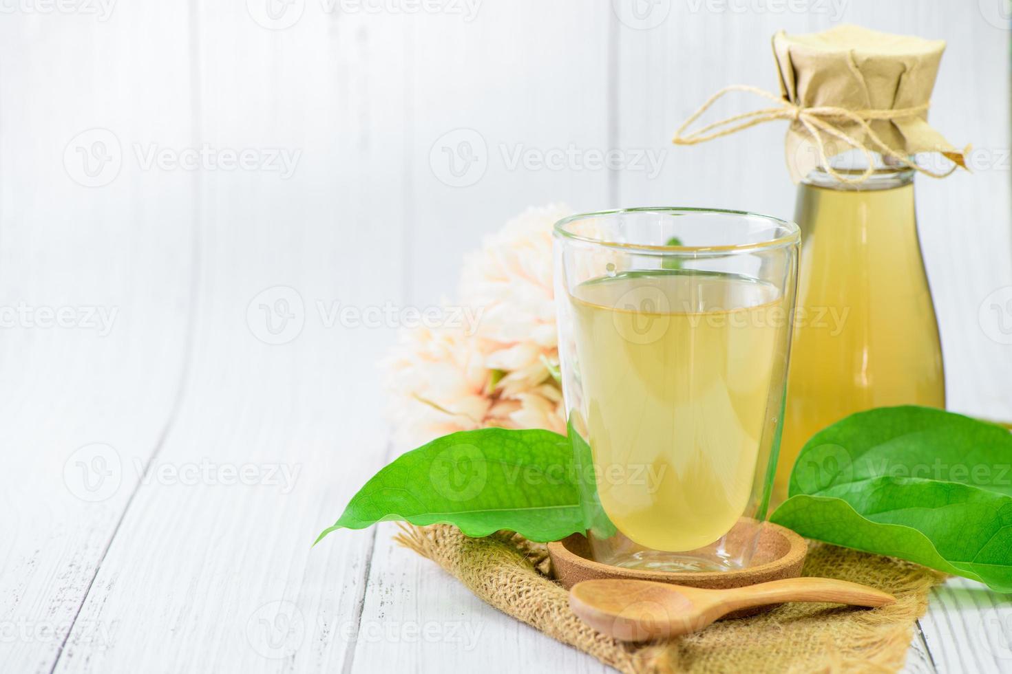 Kombucha tea with Tiliacora triandra or Bamboo grass leaf, photo