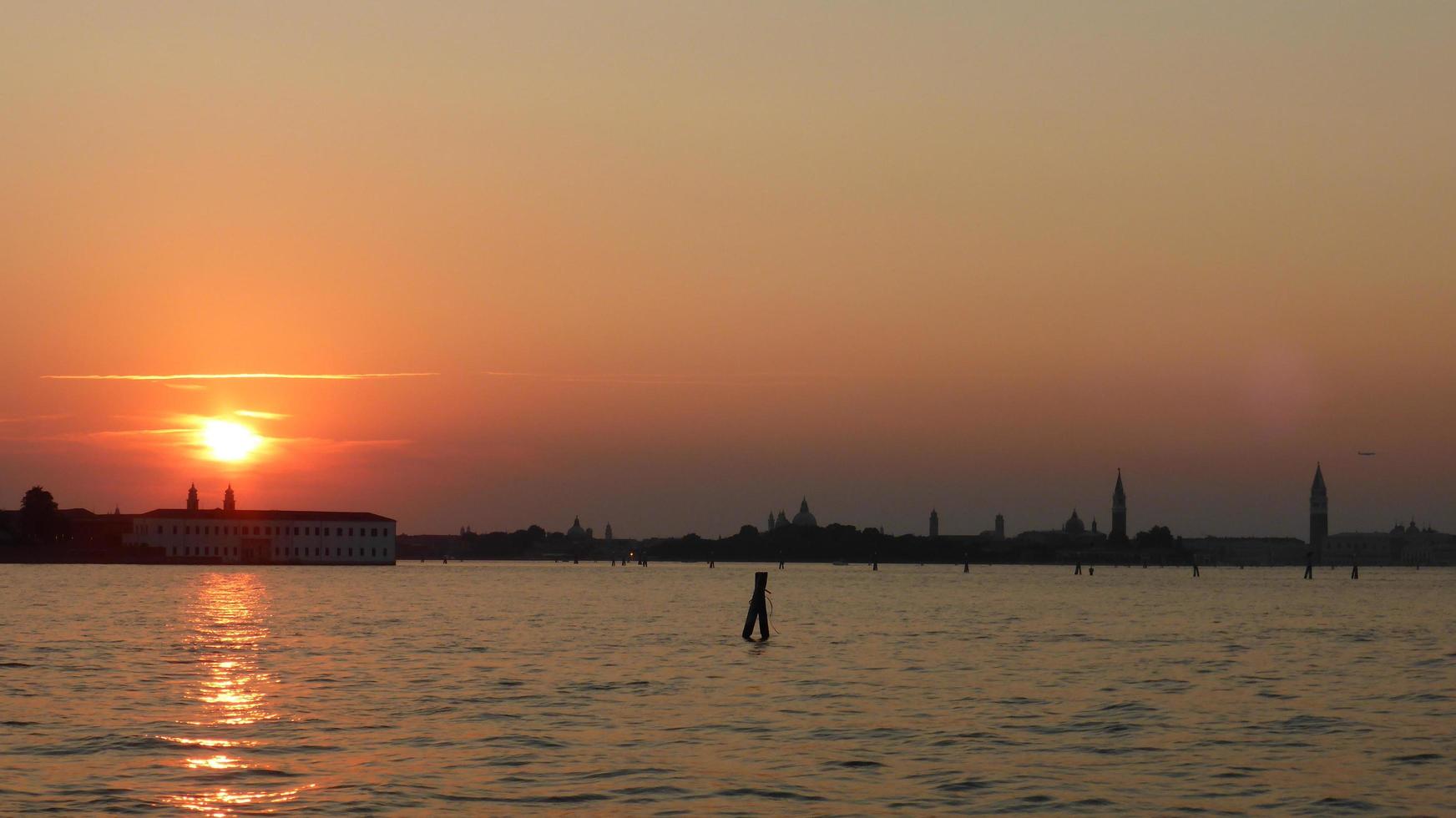 Best places to watch the sunset in Venice, Italy. photo