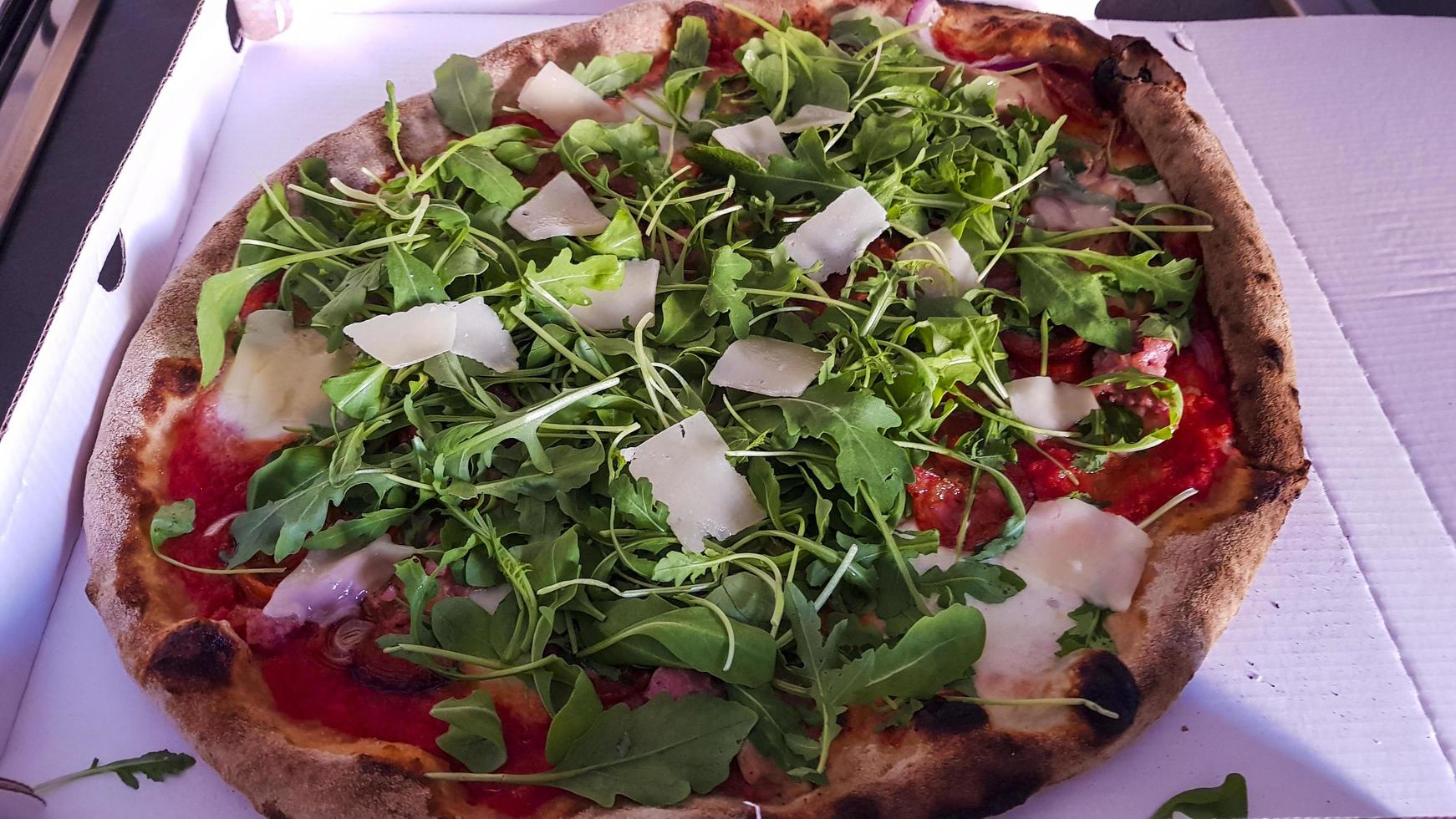Italian pizza in a box. Home delivery. photo