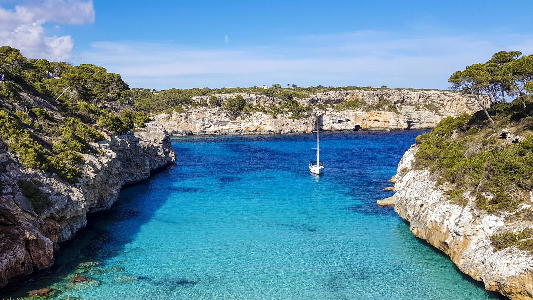 A quiet Bay with turquoise water. Blue sky. photo