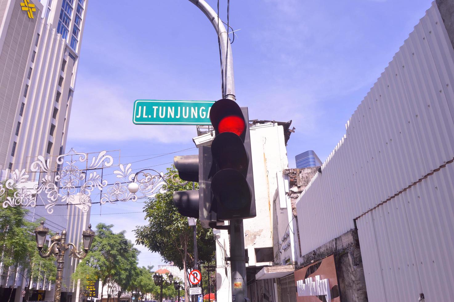surabaya, indonesia, 2022 - selective focus on traffic lights on Jalan Tunjungan Surabaya photo