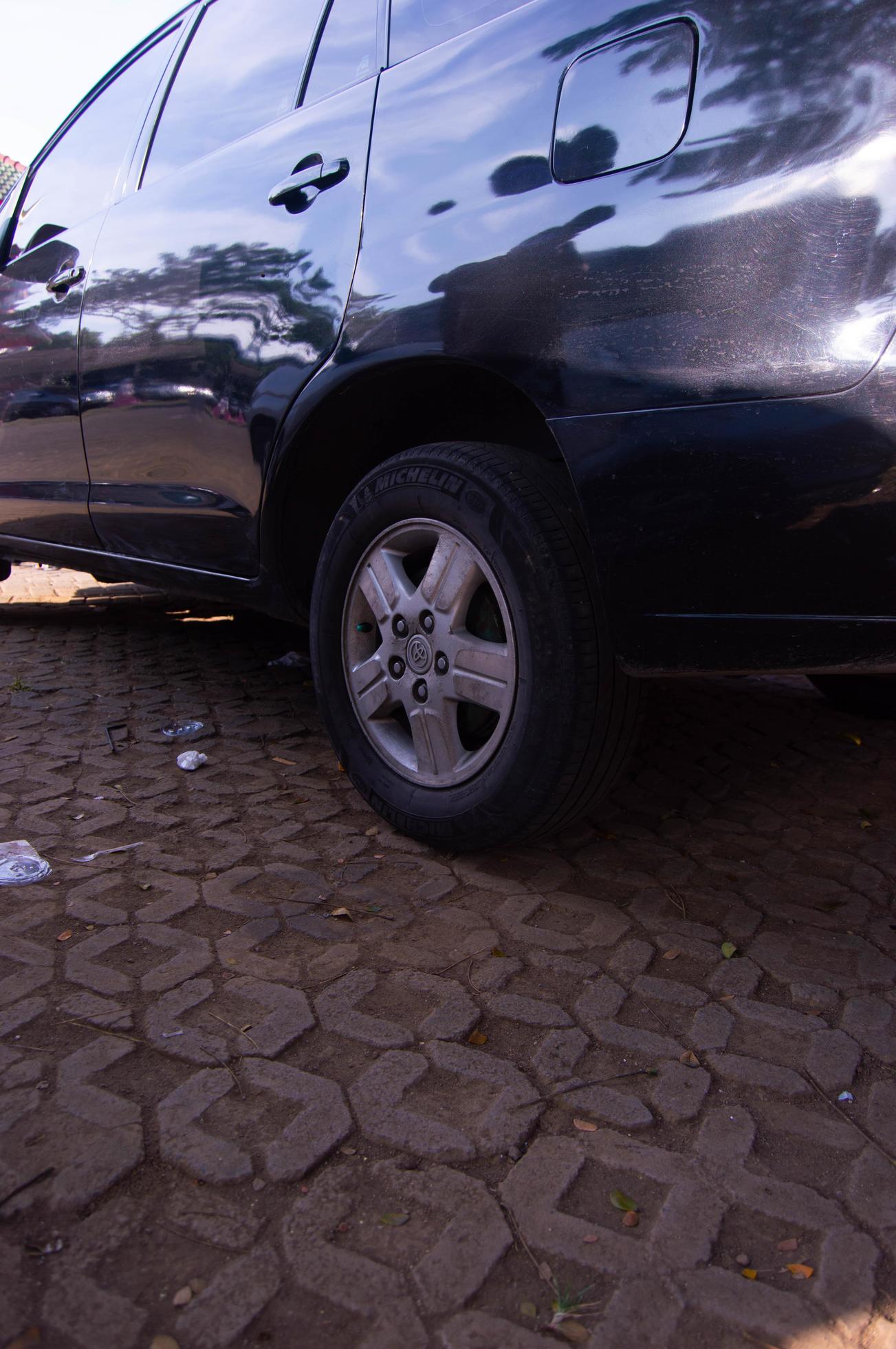 pasuruan indonesia 2022 Close up of the side of a parked car pasuruan indonesia 2022 Close up of the side of a parked car