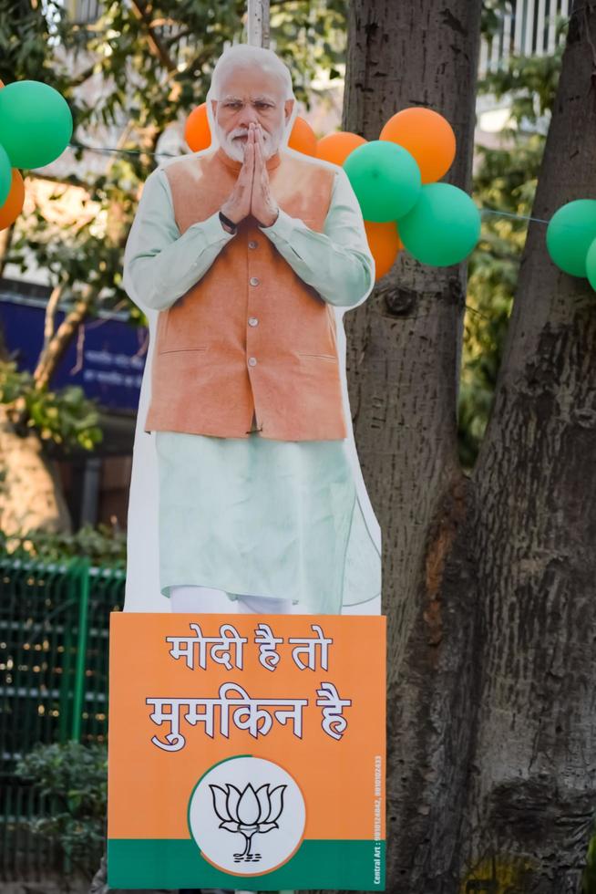 New Delhi, India - January 16 2023 - Prime Minister Narendra Modi cut out during BJP road show, the statue of PM Modi while attending a big election rally in the capital photo